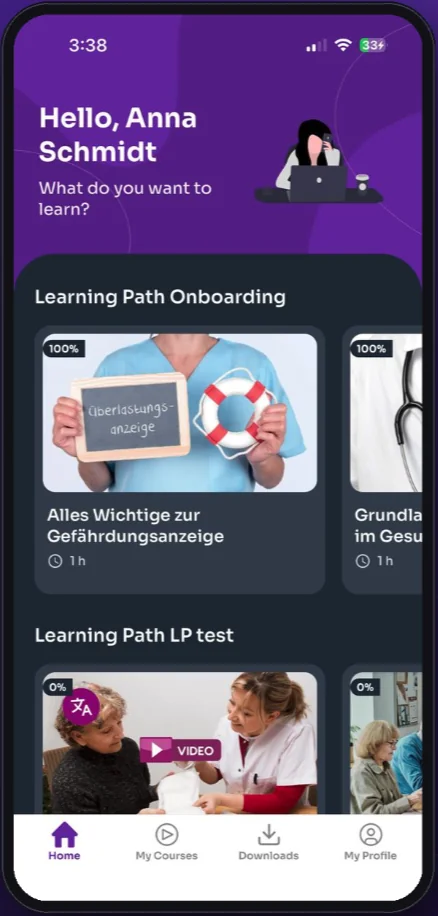 Elearnify mobile app home screen in a second organisation's purple theme, with onboarding learning paths and the offline downloads tab